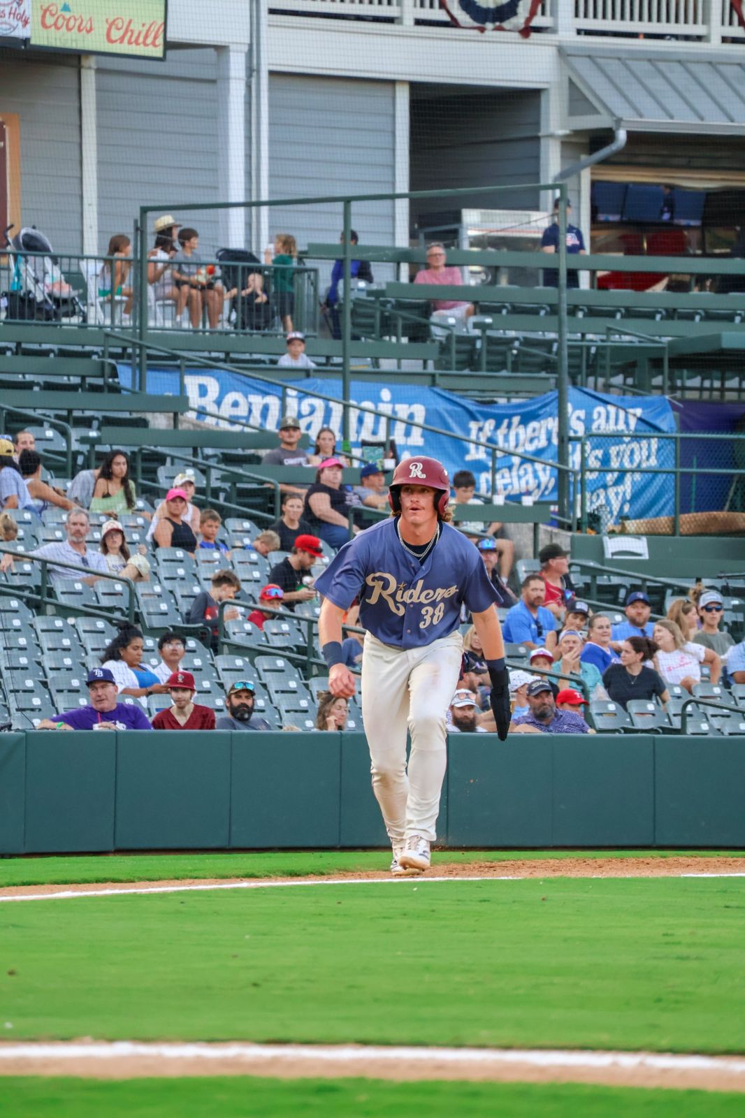 Rough Riders runner breaking for second